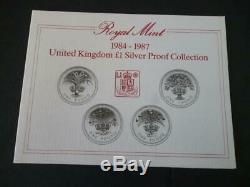 1984-1987 Uk Royal Mint Four Coin Silver Proof £1 Coin Coin Set Housed Red Case