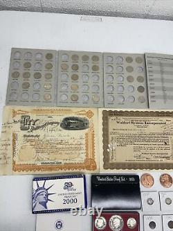 Estate Liquidation Lot ball cards, proof coins, proof sets, shares and more